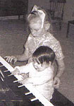 Kathie started performing early - with help from big sister